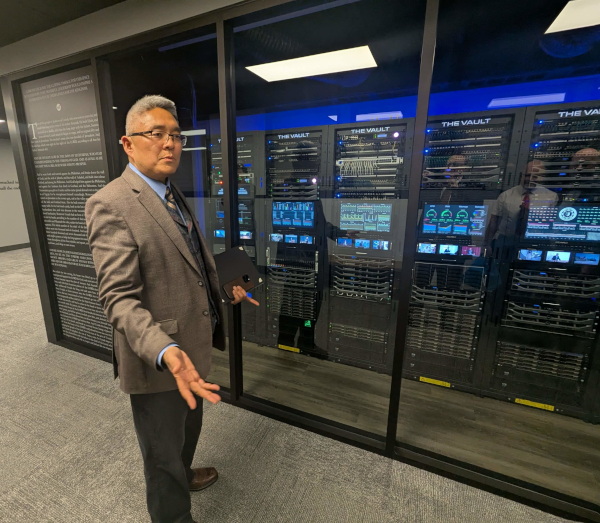 Image of Lee in front of The Vault