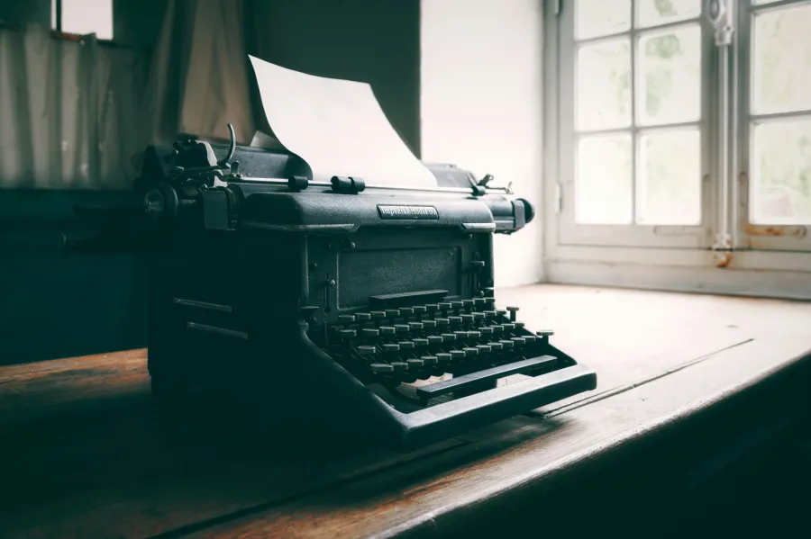 Image of antique typewriter on old table